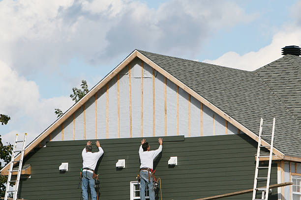 Professional Siding technician working in Columbia, PA